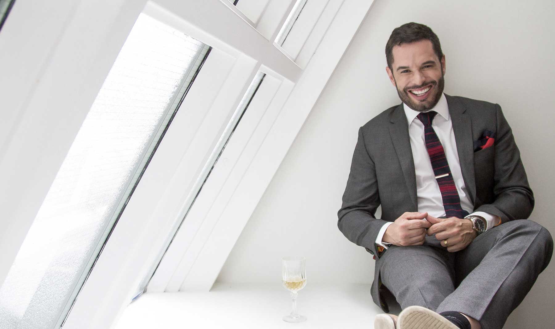 Mathieu Chantelois, Executive Director of Pride Toronto, wears our Dark Gray Birdseye Suit.